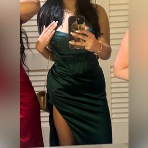 Excellent condition. for large chest, corset bodice, front slit, drape neckline.